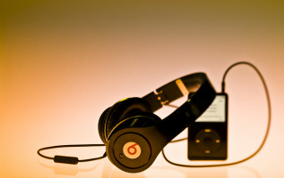 Headphones cellphone table yellow gradient - a pair of headphones free wallpaper