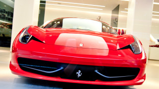 Red sports car showroom white - a white wall free wallpaper