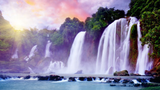 Waterfall rainbow cliff forest lake - a body of water below free wallpaper