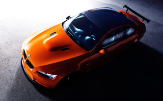 Orange sports car above dark 2 - roof free wallpaper