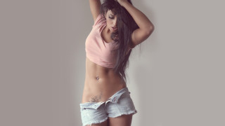 Pink shirt white shorts tattoo - her hand behind her head free wallpaper