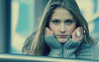 Woman longhair sweater leaning on - a rail free wallpaper