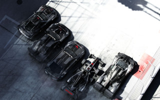Cars parked street building red - a group of cars free wallpaper