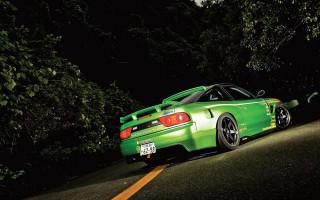 Green car night astronaut fireworks - the side of a road next free wallpaper