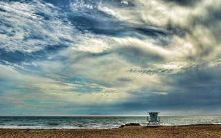 Beach chair cloudy sky ocean - a beach chair free wallpaper
