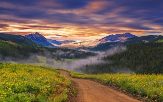 Dirt road field mountains clouds 2 - the sky above free wallpaper