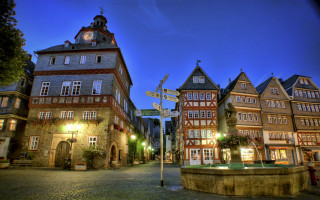 Heidelberg clock tower town square - a clock tower free wallpaper