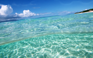 Ocean underwater island fisheye sky - a small island in the distance free wallpaper