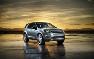 Silver car wet sunset mountains - a wet surface free wallpaper