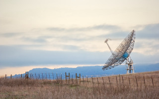 Satellite dish mountain field fence - a dry grass field next free wallpaper