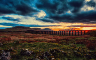Train greenfield cloudy sunset cityscape - a train free wallpaper
