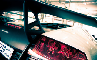 White car red taillight garage - free textures wallpaper