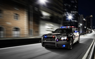 Police car city street night - a police car free wallpaper