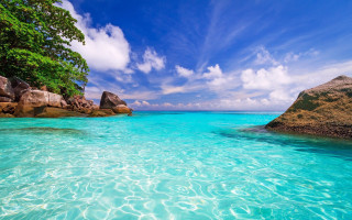 Lake rocks blue sky clouds - rock free wallpaper