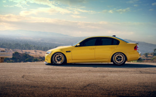 Yellow car mountain road sky - refined free wallpaper