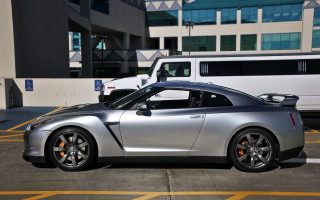 Silver sports car parking lot 3 - matte finish free wallpaper