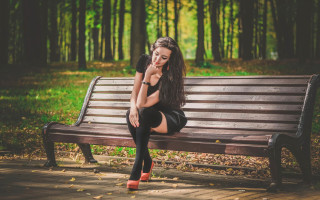 Woman sitting park fashion blackdress - a bench in a park free wallpaper