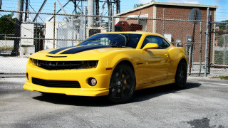 Yellow sports car parking lot 16 - a yellow sports car free wallpaper