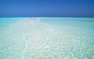 Beach water boat blue sky - ocean free wallpaper