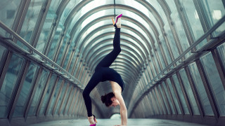 Woman handstand glass tunnel ballet - symmetric free wallpaper