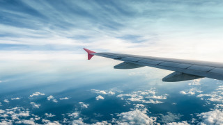 Plane wing clouds ocean blue 2 - a view of the wing free wallpaper