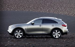 Silver car rocky road hillside - a hill in the background free wallpaper