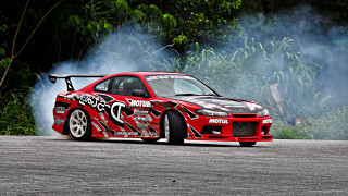 Red car smoke road forest - a red car free wallpaper