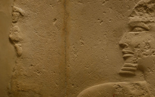 Stone carving egyptian art faces - a red marker free wallpaper