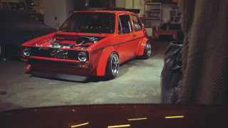 Red car garage junk tires - a red car free wallpaper