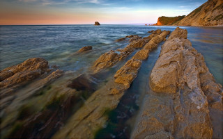 Rocky shore formation water city - a rocky shore free wallpaper