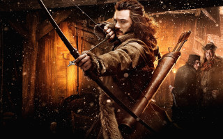 Man bow arrow snowy scene - weta digital free wallpaper
