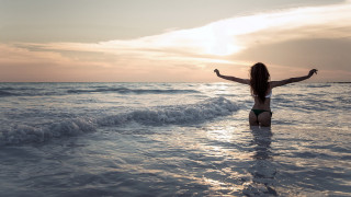 Woman bikini ocean arms outstretched - beach free wallpaper