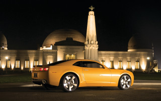 Yellow sports car night clocktower - annie leibovitz free wallpaper