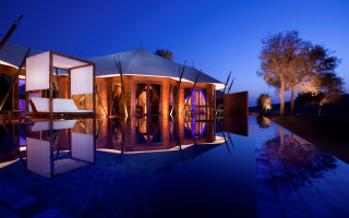 Large building pool night lights - a pool in front free wallpaper