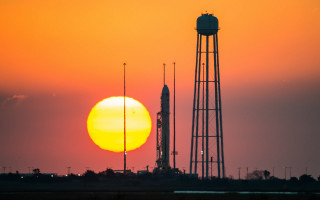 Sunset tower rocket orange sky - a sunset free wallpaper