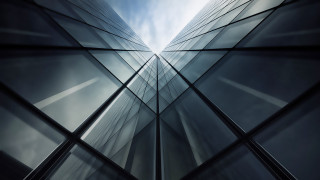 Tall building windows blue sky 2 - a blue sky and some clouds free wallpaper