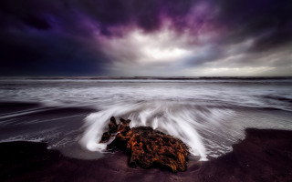 Rock beach storm purple sky - a purple sky above free wallpaper