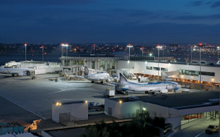 Airplanes night terminal city lights - eddie mendoza free wallpaper