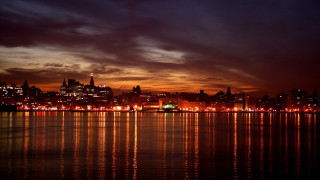 City skyline night reflection water - a reflection of the water free wallpaper