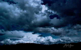 Cloudy sky hill stormy beach - stormy weather free wallpaper