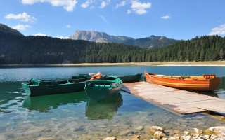 Lake mountains dock boats sky - alen divi free wallpaper