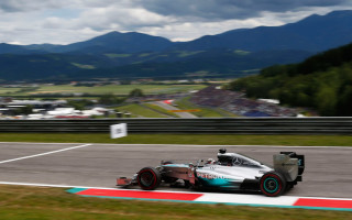 Race car mountains cloudy sky - a race car free wallpaper