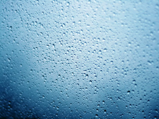 Blue water droplet macro rain - a macro photograph free wallpaper