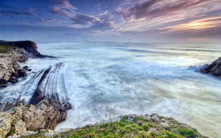 Rocky coastline sunset waves clouds - a view free wallpaper