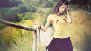 Woman yellow shirt cellphone fence - evaline ness free wallpaper