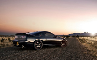 Black car sunset mountains pink - the side of a road free wallpaper
