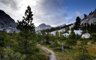 Mountain meadow trail forest lake - a mountain in the distance free wallpaper