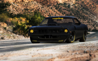 Black car yellow sign desert 2 - a road in the desert free wallpaper
