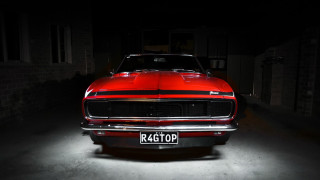 Red car dark garage brick - a dark garage free wallpaper