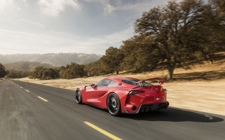 Red sports car road trees - side profile free wallpaper